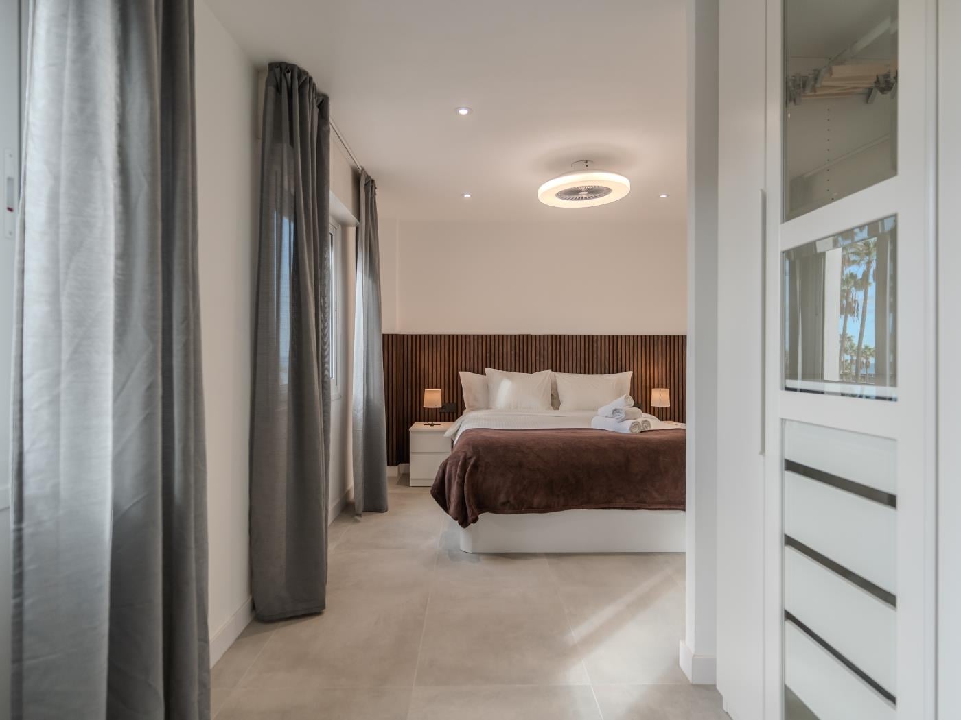 Apartamento de dos dormitorios con piscina y pista de tenis en Costa Adeje